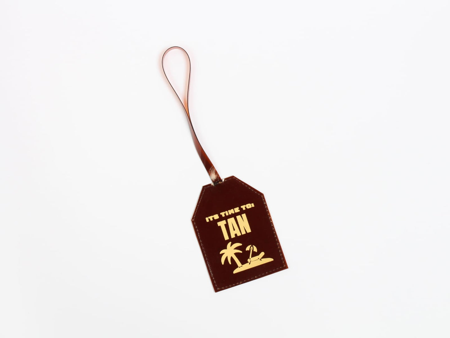 Luggage tag “TAN “